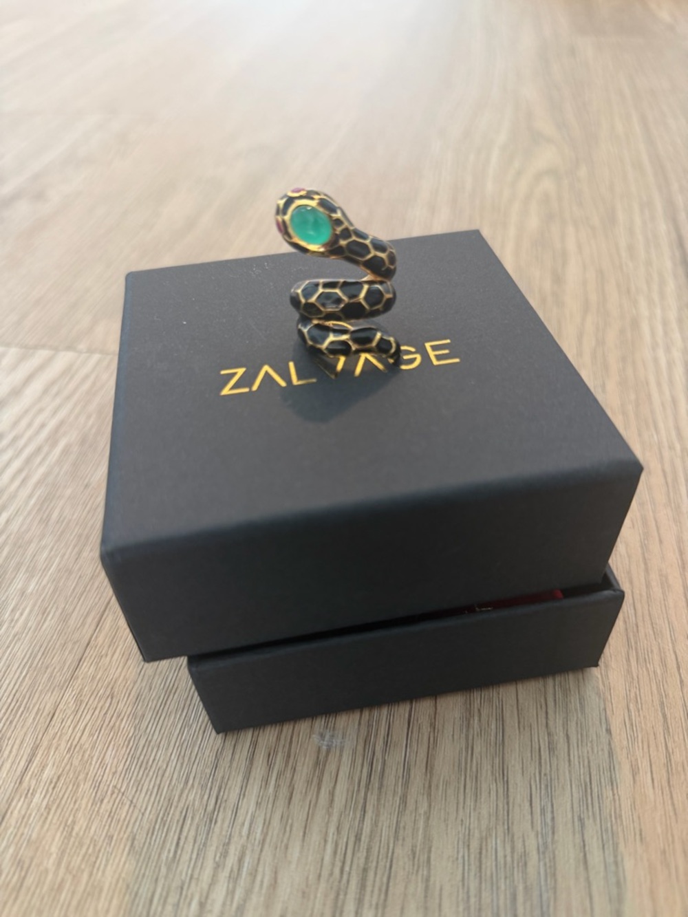 Gold Snake Coil Ring with Green Gemstone